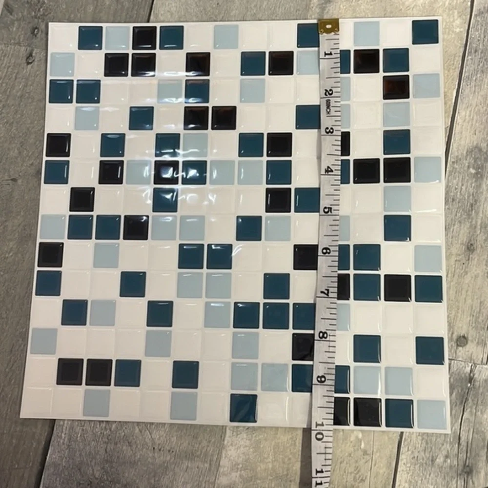 SELF-ADHESIVE 3D wall tiles. New in package.  10x10. 6 tiles. White, blue, black